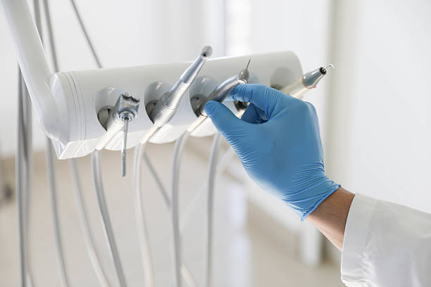 Professional Tooth Extraction technician working in Campton Hills, IL